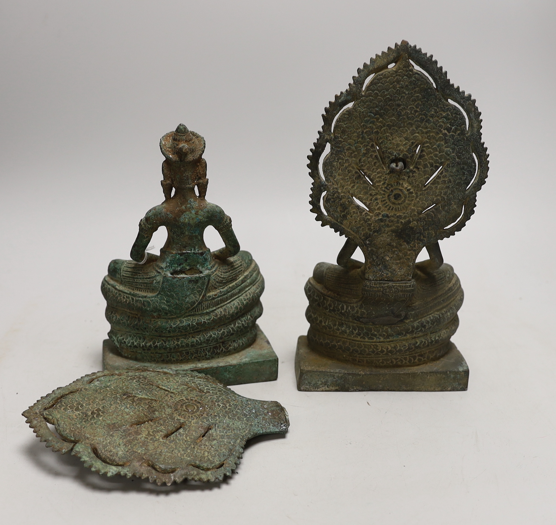 Two Cambodian bronze figures of Buddha, tallest 27cm high